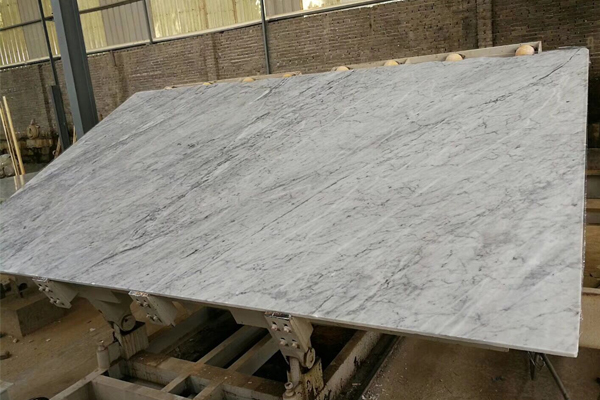 harga lempengan marmer putih carrara